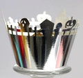 Close-up of silver Halloween cupcake wrapper with ghost and castle cutout patterns - Reflective Silver