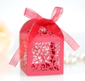 Elegant red laser-cut wedding favor box with floral patterns and a matching silk ribbon - Pearlescent Red