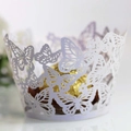Detailed laser-cut purple cupcake wrapper with butterfly pattern and golden chocolate - Light Purple