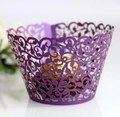 Detail of royal purple laser-cut cupcake wrapper with elegant vine pattern and gold chocolate - 5cm / Deep purple