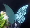 Detail of light blue laser-cut butterfly card with floral patterns for wedding glasses - Tiffany Blue