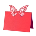 Macro shot of red laser-cut butterfly place card with intricate pearl paper texture - 50 Sheets / Pearlescent Red