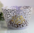 Close-up of laser-cut lavender cupcake wrapper with intricate floral vine pattern - 5cm / Lavender