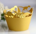Laser-cut gold dinosaur cupcake wrappers with detailed prehistoric silhouettes and pearlescent finish - Gold