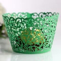 Macro shot of green laser-cut vine lace cupcake wrapper with intricate floral cutout detail - 5cm / Dark Green