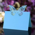 Close-up of laser cut butterfly wedding table card in light blue with floral background - Sky Blue