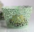 Macro shot of mint green laser-cut cupcake wrapper with elegant vine hollow pattern - 5cm / Fruit Green