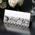 Elegant white laser-cut lace place card with floral hollow pattern for wedding tables - White