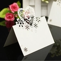 Elegant white laser-cut heart and floral wedding place card displayed at a 45-degree angle - White Heart Floral Hollow (XWK-5)