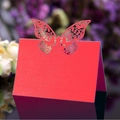 Red laser-cut butterfly table card with hollow floral patterns for wedding seat decor - Pearlescent Red