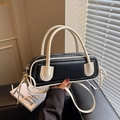 Bolso boston minimalista en contraste blanco y negro con correa de hombro desmontable - Negro