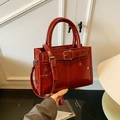 Retro dark red patent leather handbag with adjustable strap and decorative buckle - Red