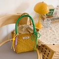 Handwoven straw bucket bag with green cotton handles and beige drawstring liner - Green