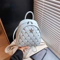 Light blue mini quilted backpack featuring rhinestone details and silver star accent - Blue