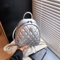 Silver quilted mini backpack featuring a sparkling star crystal and mirrored finish - Silver
