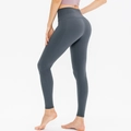 Dark grey high-waisted yoga leggings for women featuring a seamless peach-lift design - XL / Bottoms / Gray