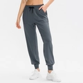 Women's loose high-waist yoga joggers in dark grey with adjustable black drawstring - M / Gray