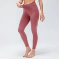 High-waisted dusty rose camo yoga leggings with side pockets and elastic fit - XS / Mysterious Brown