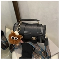 Classic black Boston bag with wide geometric strap and brown plush charm - Black With Pendant