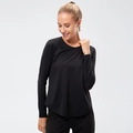 Women's long sleeve black athletic yoga t-shirt with loose fit and quick-dry fabric - M / Black