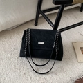 Fashionable black suede tote bag with silver chain strap on a minimalist carpet - Black (No Pendant)