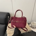 Large burgundy suede tote bag with golden buckle and adjustable shoulder strap - Red