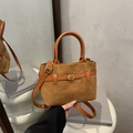 Retro tan suede crossbody bucket bag with contrasting orange straps and gold buckle - Brown