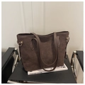 Detailed close-up of dark brown suede tote bag with smooth leather trim and gold metal buckles - Coffee Without Pendant
