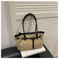 Close-up of khaki suede tote bag with black leather straps on a white decorative surface - Khaki Without Pendant
