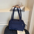 Minimalist navy blue canvas tote bag with dual handles and front zipper pocket - Blue