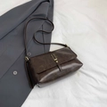 Retro deep brown large capacity crossbody bag with rectangular metal buckle on grey blazer - Brown