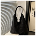 Detail of black leopard print hobo bag texture and wide strap on canvas material - Black