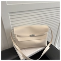 Minimalist beige PU leather crossbody bag with silver rotating lock and shoulder strap - White