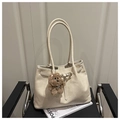 Cream vintage tote bag with brown plush bear charm and long leather handles - With Pendant / White