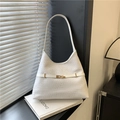 Elegant white woven shoulder hobo bag with gold metal buckle detail in soft natural light - White