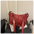 Retro red motorcycle style shoulder bag featuring silver rivets and wide leather strap - Red