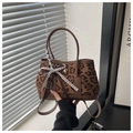 Leopard print crossbody bag with brown leather handles and lace bow detail charm - Leopard Brown