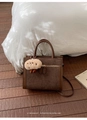 Retro brown suede tote bag with leather trim, featuring round handles and a plush charm - Coffee with Pendant