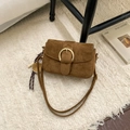 Brown frosted suede shoulder bag with vintage round gold buckle and woven charm - Brown with Pendant