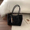 Minimalist black suede tote bag with wooden bead tassel on a soft white carpet - Black without Pendant