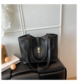 Retro black woven tote bag with a golden metal buckle and long shoulder straps - Black