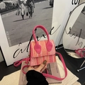 Chic pink and orange woven mini crossbody bag with leather handle and golden metal accents - Pink