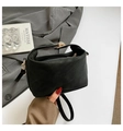 Minimalist black matte faux leather handbag with gold metal clasp and handle - Black