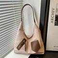 Minimalist beige tote bag with brown straps on a window sill under soft sunlight - Pink