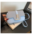 Light blue crossbody bag with woven texture flap and golden geometric metal lock - Blue