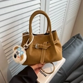 Brown suede crossbody bag with decorative buckle strap and plush bear charm - With Pendant / Brown