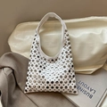 White leather hobo bag with silver round rivets decoration and stylish shoulder strap - White