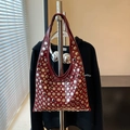 Dark red crescent shoulder bag with silver rivet studs and minimalist leather finish - Red