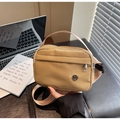Khaki nylon crossbody bag with dual zipper compartments and pink adjustable strap - Khaki