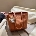 Brown suede tote bag with plush bear charm and thin shoulder straps for daily use - Brown with Pendant
